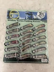 American Wildlife Series 18 Folding Pocket Knives Display Sealed. Fixed Price $59.99.