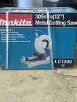 Makita LC1230 12-INCH Corded Metal Cutting Saw, 15 Amp 1,700 Rpm. Fixed Price $700.00.