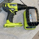 Ryobi One+ P215 18 Lithium-ion 1/2 Inch Cordless Drill Driver W/batt &charger. Fixed Price $45.00.