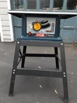 Ryobi BTS10 10-INCH Table Saw 115V 13AMP Corded W/steel Stand. Fixed Price $160.00.