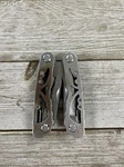 Husky Silver Multi Pliers, Saw, Switchblade, Ect - 9 Tools Total. Fixed Price $17.10.