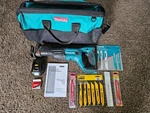 Makita Cordless Recipro Saw XRJ03Z, #1 Battery, Bag, Blades, Brush. Fixed Price $310.00.