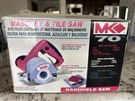 4 Masonry Saw Handheld Diamond MK-70 Brick Tile Cutter Brand New Open Box. Fixed Price $125.00.