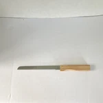 Sterling Force Stainless Steel Serrated Knife 11 Blade Wood Handle. Fixed Price $14.00.