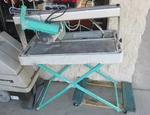 Imer Combi 250V 10" Tile Saw With Stand. Fixed Price $400.00.