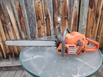 Husqvarna 357XP Chainsaw. Fixed Price $599.00.
