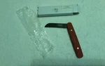 Nibox Camillus Titanium Folding Knife Carbo By Acme United Corp Red Handle. Fixed Price $10.00.