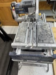 Chicago Electric 10 Inch Industrial Tile/brick Saw Includes Stand. Fixed Price $400.00.