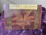 Counterart Patterned Palms Heat Tolerant Tempered Glass Cutting Board 12 X 8". Fixed Price $13.74.
