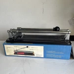 Qep 12" Professional Tile Cutter 1/2" Cutting Wheel Dual Polished Rails Model B. Fixed Price $15.00.